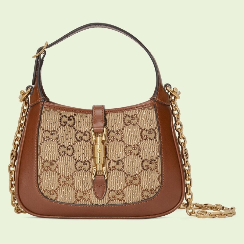 G*u*i top handle bags